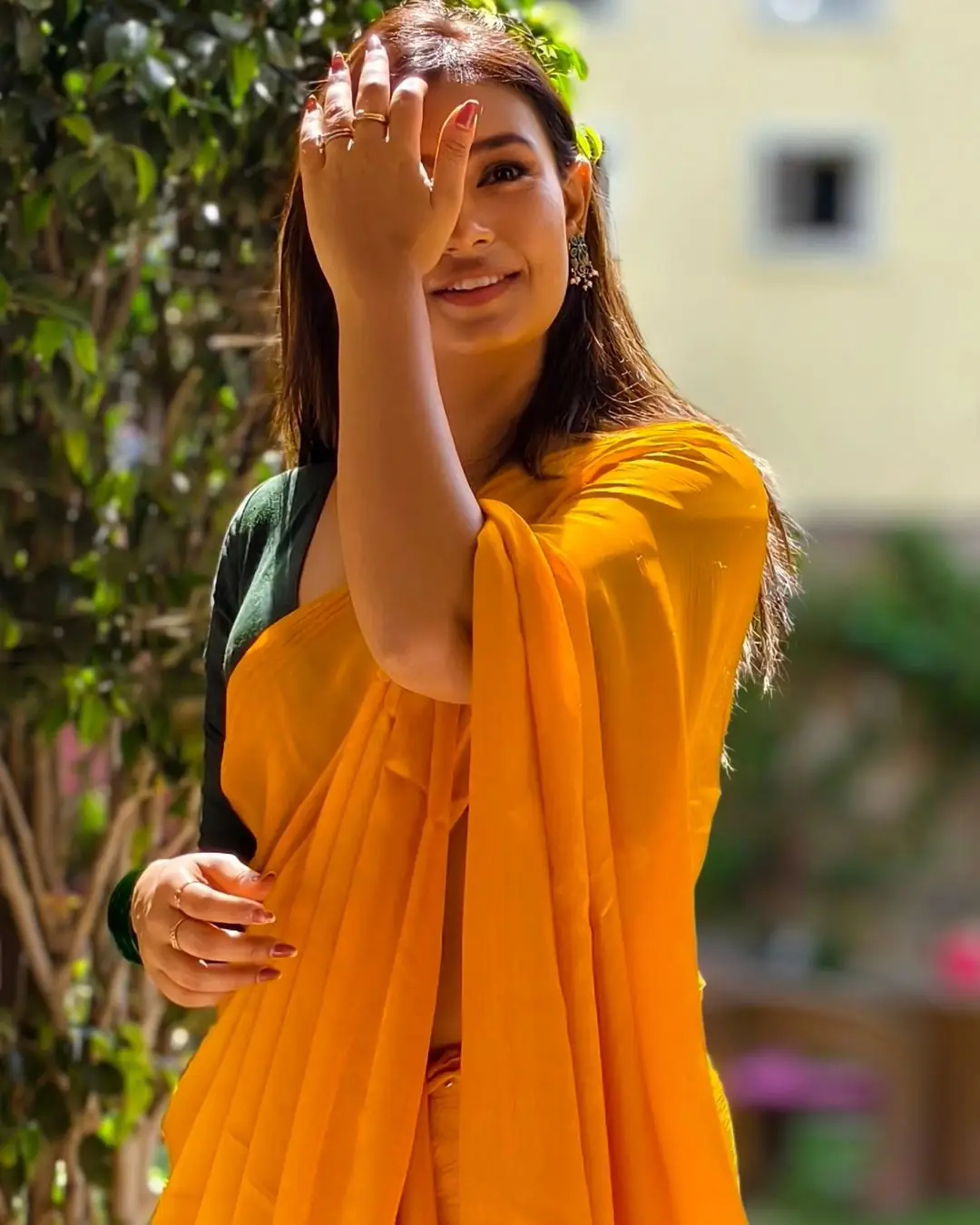 Telugu TV Actress Deepa Jagadeesh Stills In Orange Saree Green Blouse